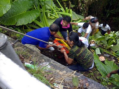 Hit-and-run slams Phuket woman off the road and into a ravine