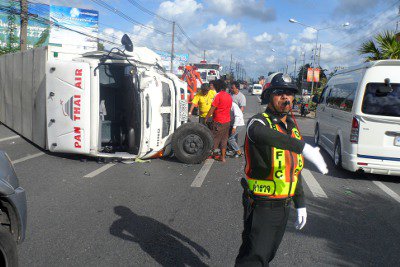 Express mail truck flips in Phuket, no injuries