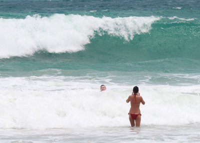 Phuket tourists left to save themselves from dangerous surf