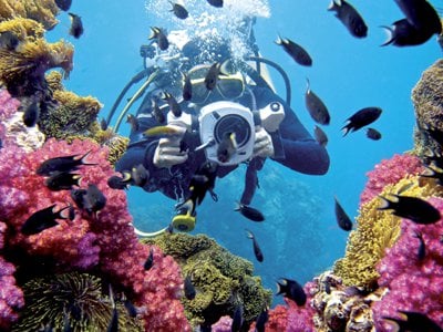 Phuket Diving: Camera rolling, regulator in