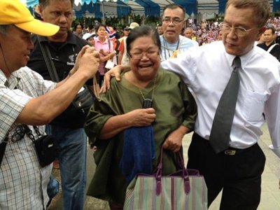 Woman faces lese majeste charge pending mental examination