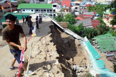 Lucky escape for mother, baby as Phuket hillside resort wall collapses