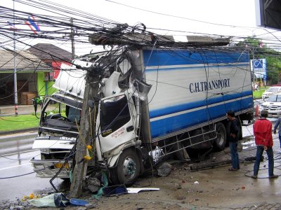 Truck crash: Phuket power pole snapped in half