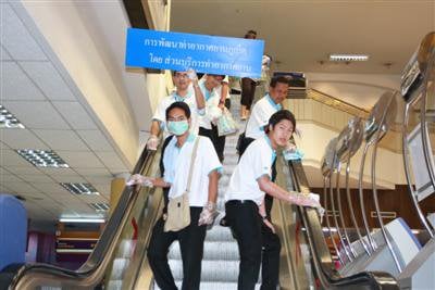 Phuket Airport staff sing for victory against swine flu