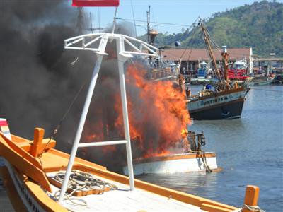 Phuket fishing boat scuttled after blaze