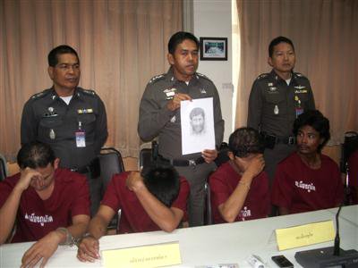 Phuket murder suspect turns self in, claims innocence