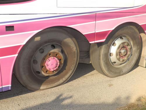 Runaway wheel from Phuket tour bus narrowly misses policeman