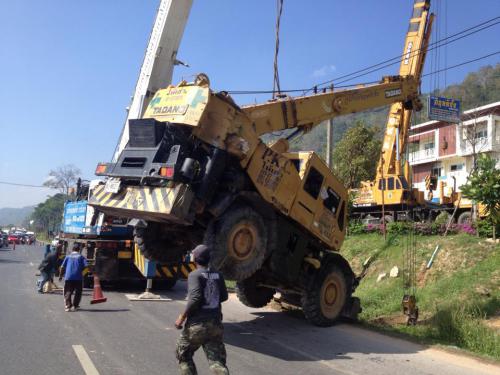 Phuket crane topples, downs power cables on bypass road