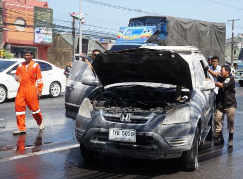 Airport-bound foreigners safe after illegal taxi catches fire