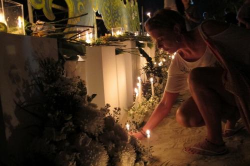 Phuket tsunami memorial service sets Patong Beach aglow