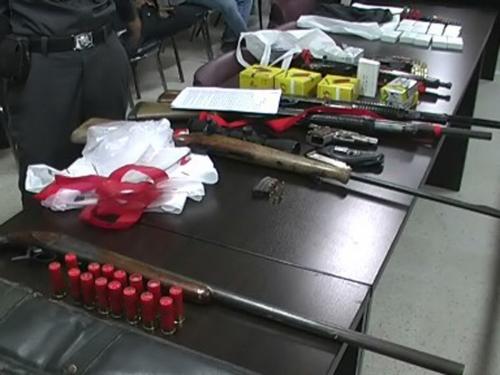 Krabi police raid turns up war weapons, meth