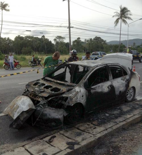 Phuket temple visit postponed after car bursts into flames