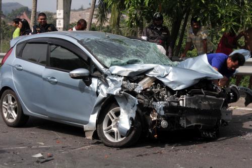 Four injured after lorry jumps lanes, smashes Phuket sedan and hits motorbike