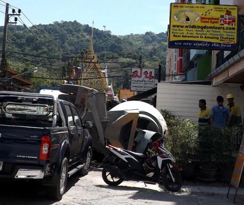 Phuket cement truck flips on late-night trip down Patong Hill