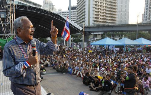 Phuket Gazette Thailand News: PDRC ponders blocking advance polls; Public gatherings banned; Red shirts marshall; Kwanchai recovering