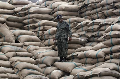 Special Report: Rice smugglers hitch ride on Thai pledge-price profiteering