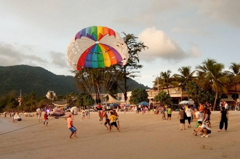 A Chinese tourist injured after fall from parasail ride on Patong Beach