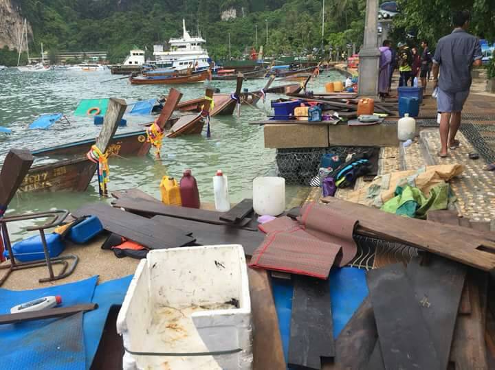 Long-tail boats at Koh Phi Phi damaged by storm