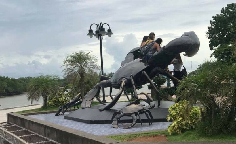 Four more tourists caught climbing crab sculpture in Krabi