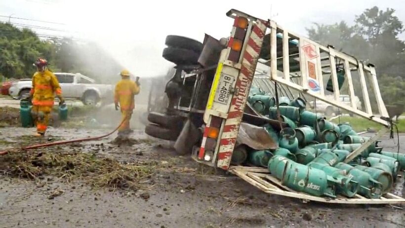 Truck carrying gas cylinders flips over in Udon Thani