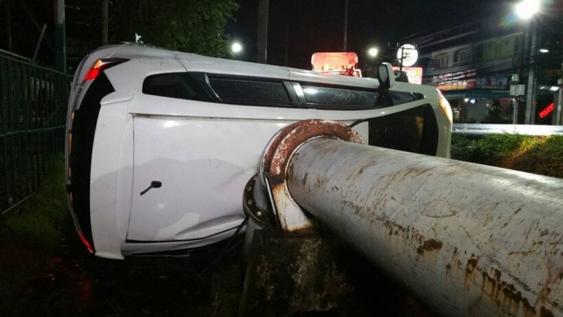 Two injured after car overturns and hits a bridge