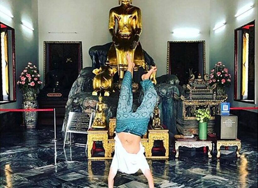 Instagrammer apologises for doing handstand at Wat Pho