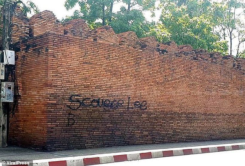 Two tourists’ graffiti might end them up in a Chiang Mai jail