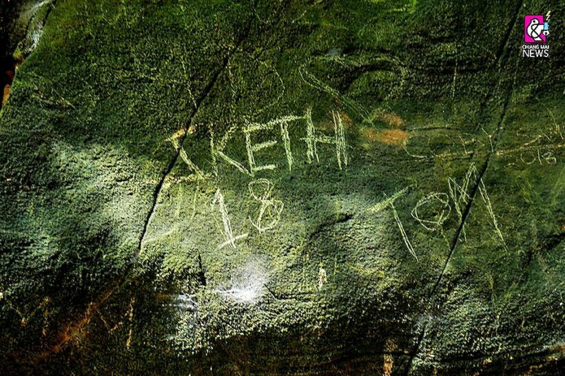 Tourists grafitti Chiang Mai caves