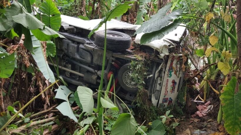 Overloaded pickup truck rolls off road into Rawai jungle