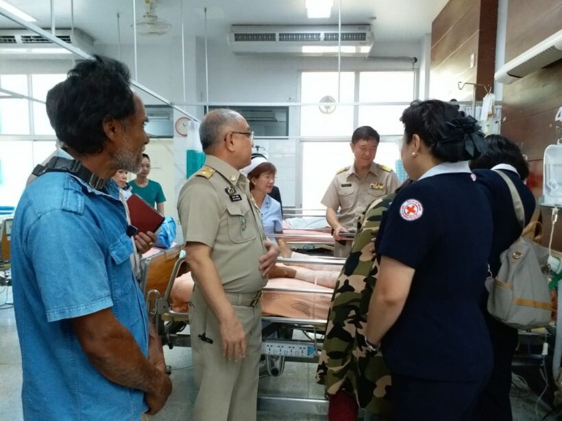 King Maha Vajiralongkorn supports boy attacked by dogs at Sarasin Bridge