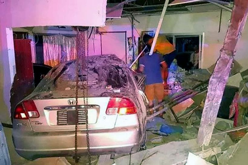 Driver slams sedan into bedroom of house killing baby and injuring others