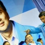 Choosing sides. Abhisit Vejjajiva will have to choose after Sunday. | Thaiger