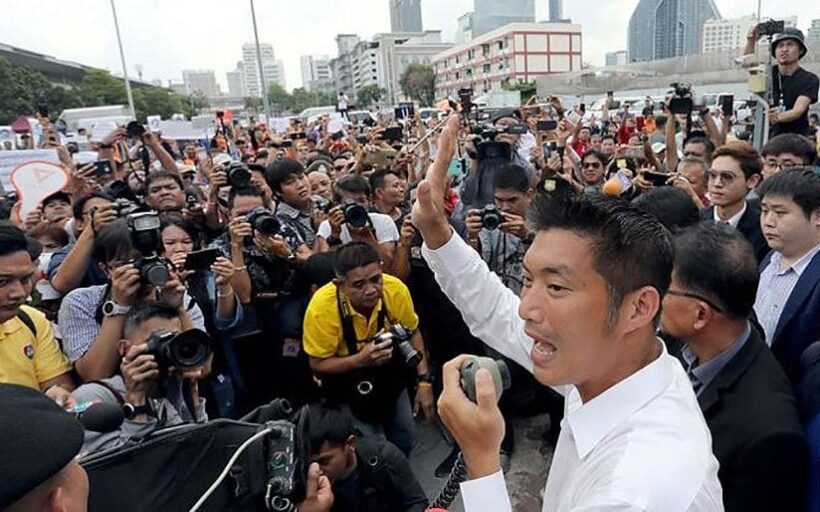 Thanathorn urged to ‘fight on’ as he surrenders to Bangkok police