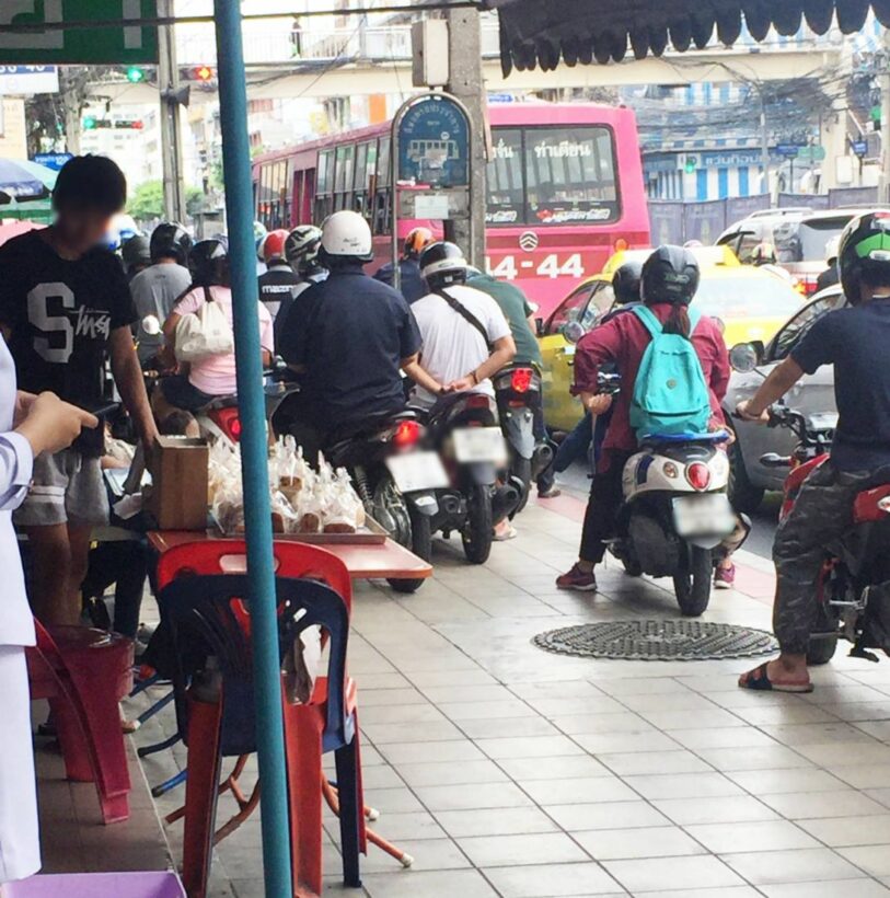 Vendors shuffled off Bangkok footpaths to make way for motorbikes