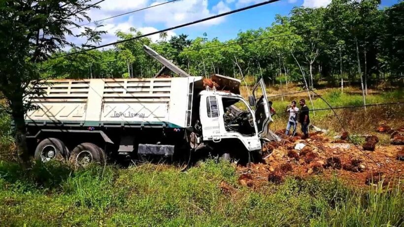 Truck collides with power pole in Krabi, driver injured