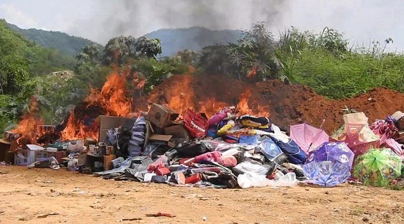 Fake goods valued at 11 million baht go up in smoke in Chiang Rai