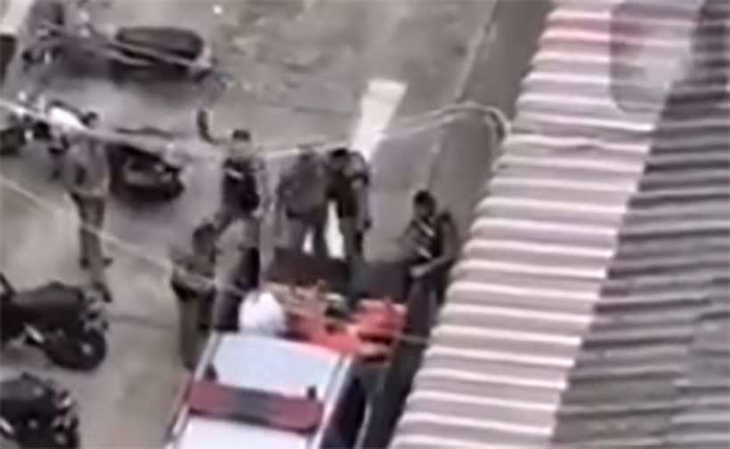 VIDEO: Bangkok police under investigation for beating up restrained drunk in back of truck