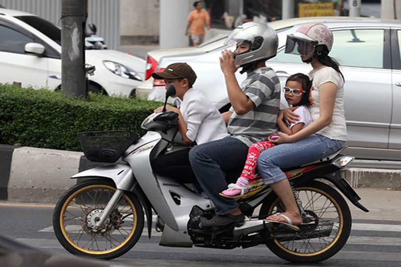 Most Thai motorcycle riders don’t wear crash helmets