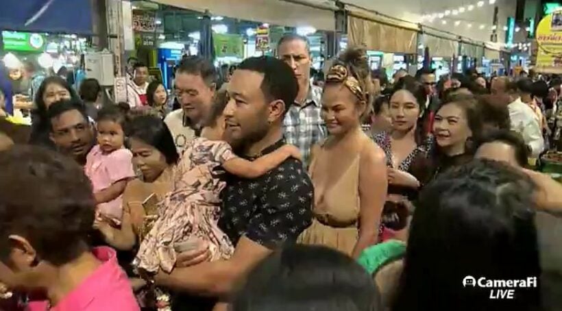 John Legend & Chrissy Teigen check out the tastes at a Korat Market