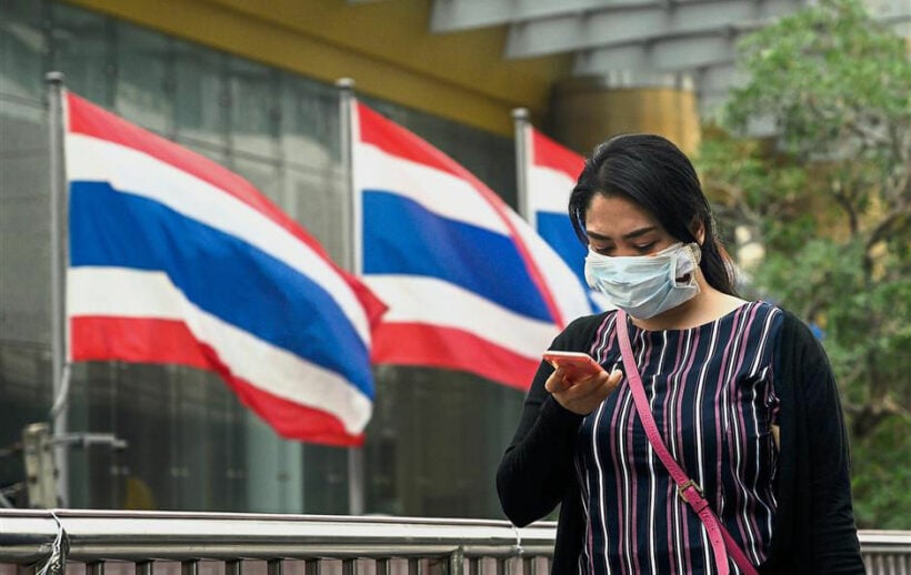 Officials hand out face masks whilst southern Thailand, Malaysia, Singapore choke