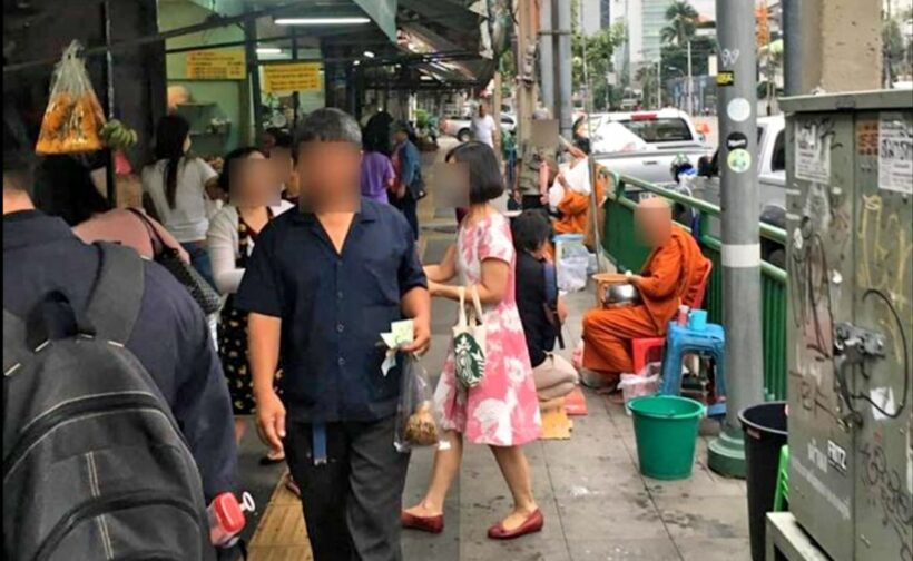 Thai monks receive alms then sell them back to traders… mmmm