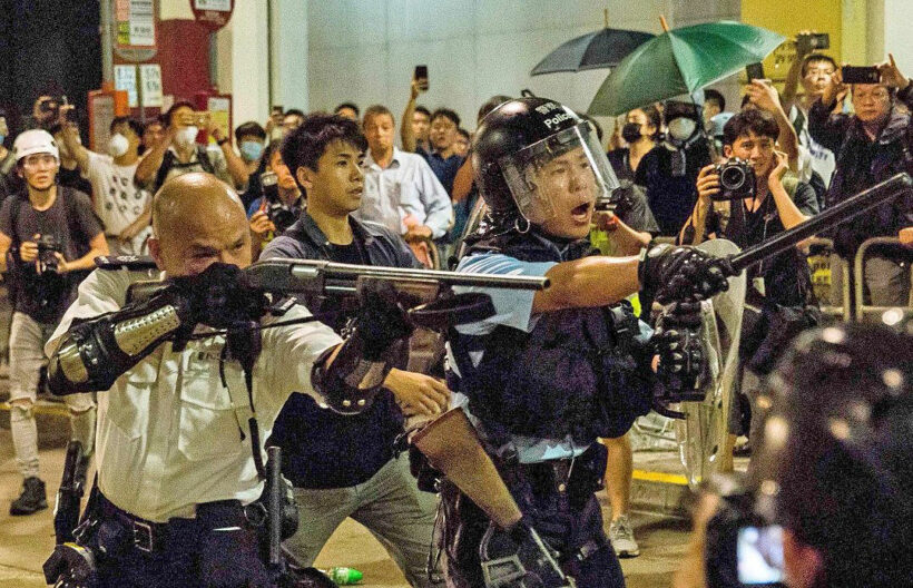 China celebrates 70 years of communism, while Hong Kong police shoot pro-democracy protester