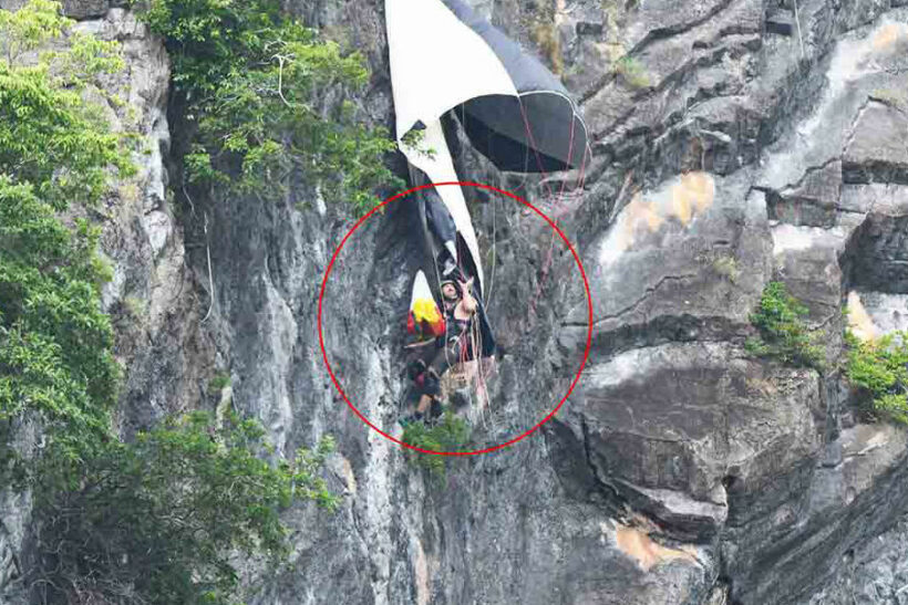 Base jumper rescued after dangling from sheer cliff face in Phattalung