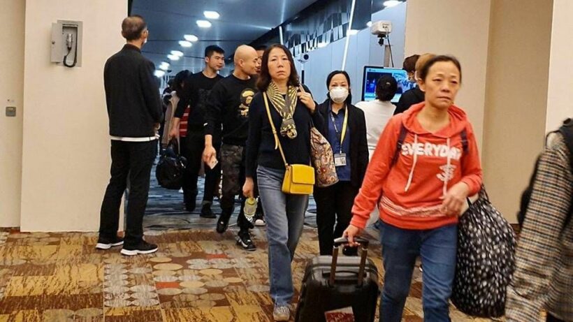 Viral pneumonia outbreak in China prompts airport checkpoints for Thai-bound passengers