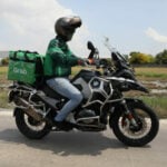 Thai airline pilot works for Grab Food delivering your food in style | Thaiger