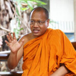 Bangkok temple develops hygienic face mask from recycled plastics | Thaiger