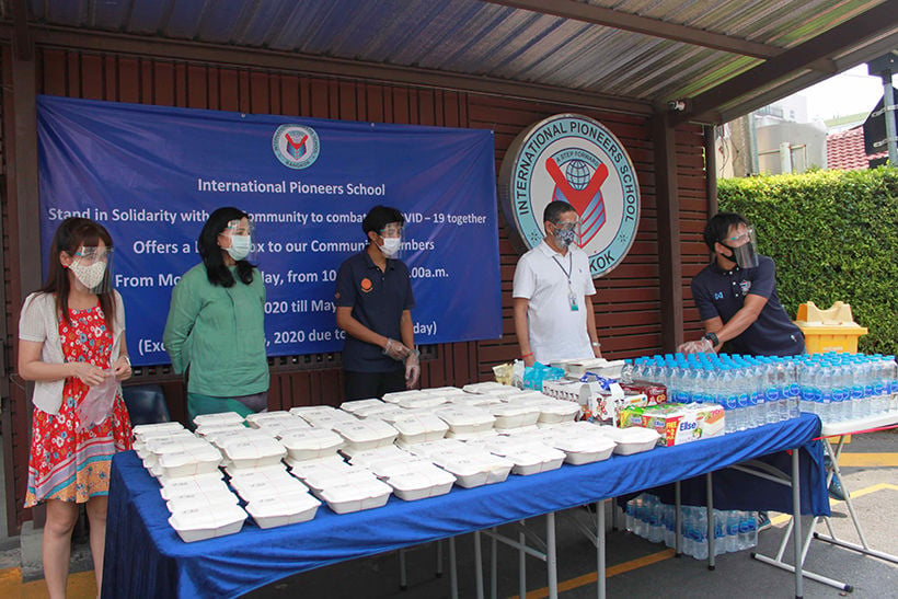 Bangkok’s International Pioneers School distributes free meals in local community