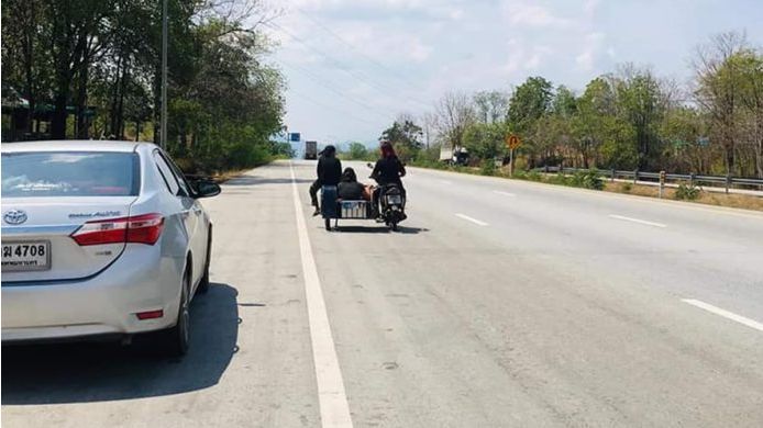 Thai family heads out on a 1,000 kilometre trek on clapped-out motorbike