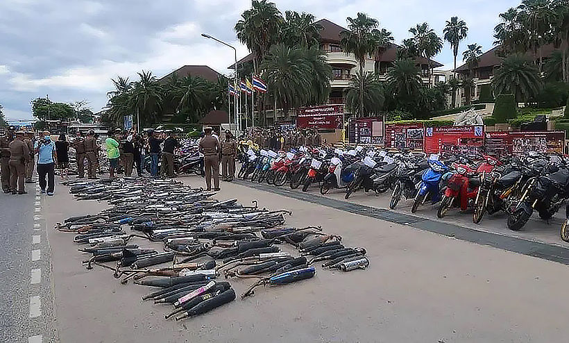 Chon Buri police hire a steam roller to destroy over 700 illegal motorbike exhausts | News by Thaiger