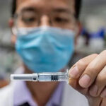 Human trials of locally made Covid-19 vaccine to begin in October | Thaiger